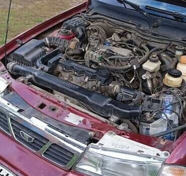 Червоний Деу Нексія, об'ємом двигуна 1.5 л та пробігом 230 тис. км за 1350 $, фото 13 на Automoto.ua