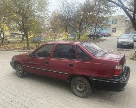 Червоний Деу Нексія, об'ємом двигуна 1.5 л та пробігом 200 тис. км за 715 $, фото 7 на Automoto.ua