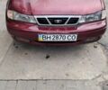 Червоний Деу Нексія, об'ємом двигуна 1.5 л та пробігом 207 тис. км за 1400 $, фото 1 на Automoto.ua