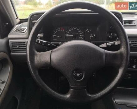 Червоний Деу Нексія, об'ємом двигуна 1.5 л та пробігом 278 тис. км за 1500 $, фото 11 на Automoto.ua