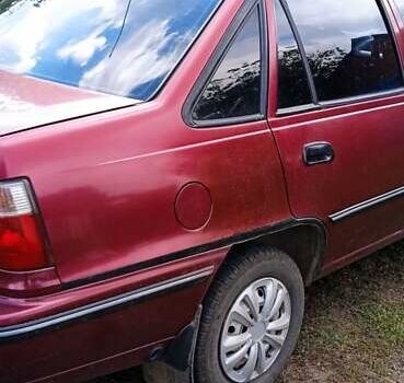 Червоний Деу Нексія, об'ємом двигуна 1.5 л та пробігом 230 тис. км за 1550 $, фото 8 на Automoto.ua