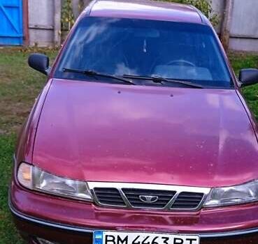 Червоний Деу Нексія, об'ємом двигуна 1.5 л та пробігом 230 тис. км за 1550 $, фото 2 на Automoto.ua