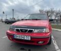 Червоний Деу Нексія, об'ємом двигуна 1.5 л та пробігом 214 тис. км за 2000 $, фото 1 на Automoto.ua