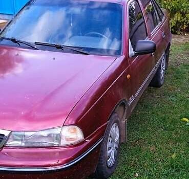 Червоний Деу Нексія, об'ємом двигуна 1.5 л та пробігом 230 тис. км за 1350 $, фото 10 на Automoto.ua