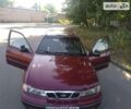 Красный Дэу Нексия, объемом двигателя 1.5 л и пробегом 293 тыс. км за 2000 $, фото 1 на Automoto.ua