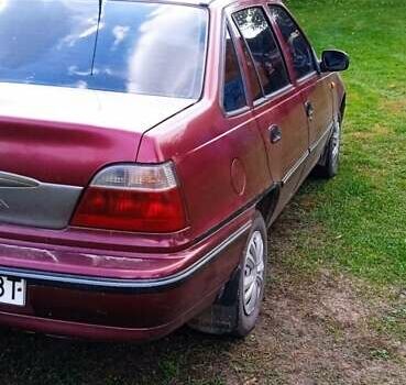 Червоний Деу Нексія, об'ємом двигуна 1.5 л та пробігом 230 тис. км за 1550 $, фото 12 на Automoto.ua