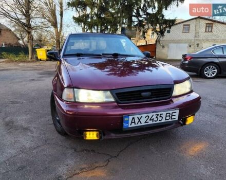 Червоний Деу Нексія, об'ємом двигуна 1.5 л та пробігом 182 тис. км за 1390 $, фото 1 на Automoto.ua