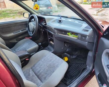 Червоний Деу Нексія, об'ємом двигуна 1.5 л та пробігом 182 тис. км за 1390 $, фото 7 на Automoto.ua