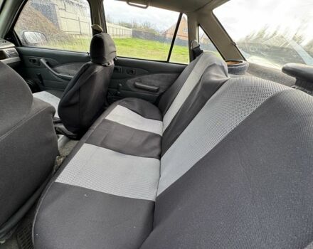 Червоний Деу Нексія, об'ємом двигуна 1.5 л та пробігом 250 тис. км за 750 $, фото 6 на Automoto.ua