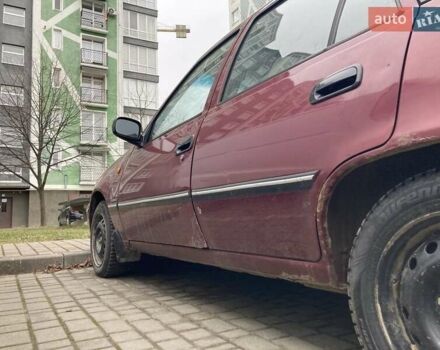 Червоний Деу Нексія, об'ємом двигуна 1.5 л та пробігом 145 тис. км за 1000 $, фото 4 на Automoto.ua