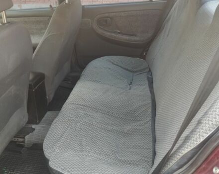 Червоний Деу Нексія, об'ємом двигуна 1.5 л та пробігом 240 тис. км за 1700 $, фото 11 на Automoto.ua