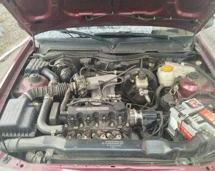 Червоний Деу Нексія, об'ємом двигуна 1.5 л та пробігом 141 тис. км за 1800 $, фото 5 на Automoto.ua