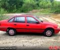 Красный Дэу Нексия, объемом двигателя 1.5 л и пробегом 211 тыс. км за 1300 $, фото 1 на Automoto.ua