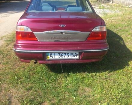 Червоний Деу Нексія, об'ємом двигуна 1.5 л та пробігом 155 тис. км за 1000 $, фото 1 на Automoto.ua