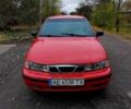 Червоний Деу Нексія, об'ємом двигуна 1.5 л та пробігом 258 тис. км за 1400 $, фото 3 на Automoto.ua