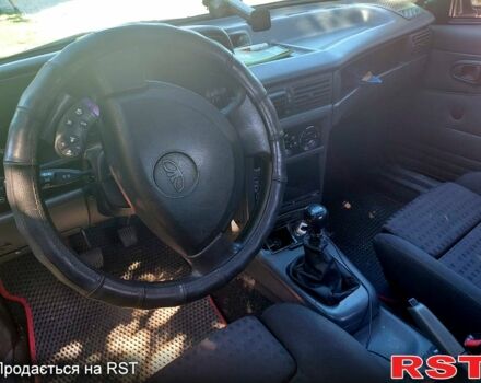 Красный Дэу Нексия, объемом двигателя 1.5 л и пробегом 190 тыс. км за 1600 $, фото 2 на Automoto.ua