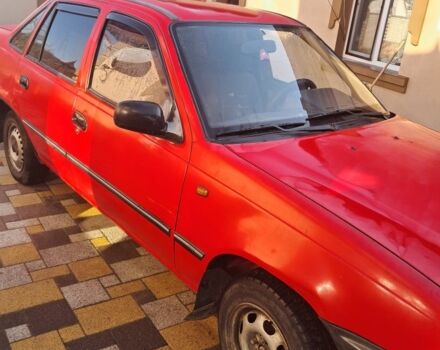 Красный Дэу Нексия, объемом двигателя 1.5 л и пробегом 165 тыс. км за 1000 $, фото 1 на Automoto.ua