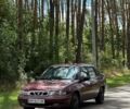 Червоний Деу Нексія, об'ємом двигуна 1.5 л та пробігом 250 тис. км за 719 $, фото 1 на Automoto.ua