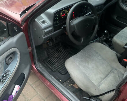 Червоний Деу Нексія, об'ємом двигуна 1.5 л та пробігом 240 тис. км за 950 $, фото 4 на Automoto.ua