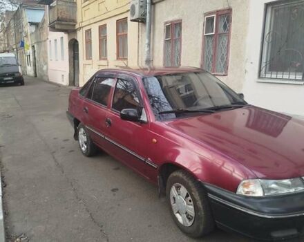 Червоний Деу Нексія, об'ємом двигуна 1.5 л та пробігом 141 тис. км за 1800 $, фото 1 на Automoto.ua