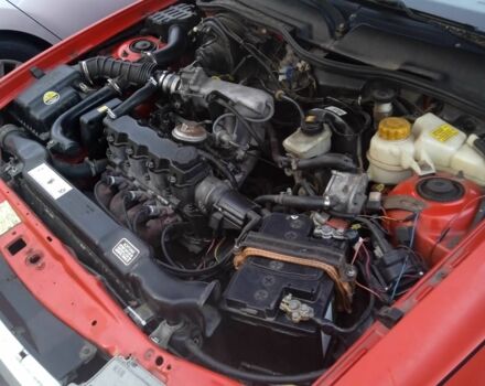 Червоний Деу Нексія, об'ємом двигуна 1.5 л та пробігом 170 тис. км за 1300 $, фото 7 на Automoto.ua