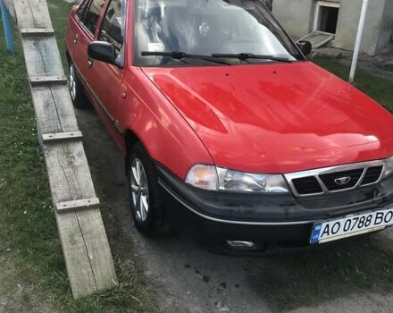 Червоний Деу Нексія, об'ємом двигуна 1.5 л та пробігом 195 тис. км за 1500 $, фото 5 на Automoto.ua