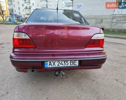 Червоний Деу Нексія, об'ємом двигуна 1.5 л та пробігом 182 тис. км за 1390 $, фото 4 на Automoto.ua