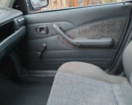 Красный Дэу Нексия, объемом двигателя 1.5 л и пробегом 31 тыс. км за 3200 $, фото 7 на Automoto.ua