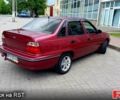 Червоний Деу Нексія, об'ємом двигуна 1.5 л та пробігом 199 тис. км за 2000 $, фото 1 на Automoto.ua