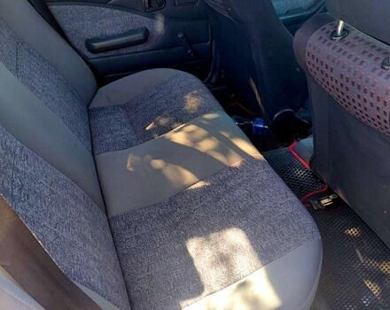 Красный Дэу Нексия, объемом двигателя 1.5 л и пробегом 190 тыс. км за 1600 $, фото 4 на Automoto.ua