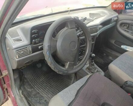 Червоний Деу Нексія, об'ємом двигуна 1.5 л та пробігом 175 тис. км за 1600 $, фото 2 на Automoto.ua