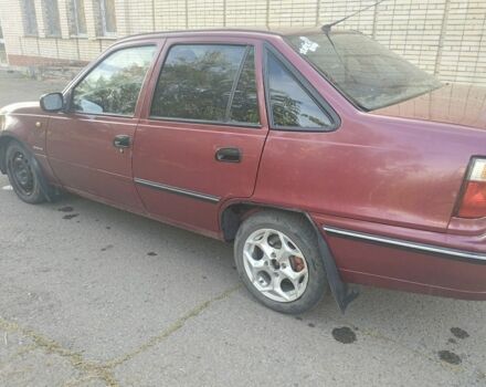 Червоний Деу Нексія, об'ємом двигуна 1.5 л та пробігом 240 тис. км за 1700 $, фото 7 на Automoto.ua