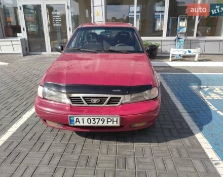 Червоний Деу Нексія, об'ємом двигуна 1.5 л та пробігом 400 тис. км за 1304 $, фото 1 на Automoto.ua