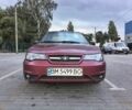 Красный Дэу Нексия, объемом двигателя 1.5 л и пробегом 263 тыс. км за 2068 $, фото 1 на Automoto.ua