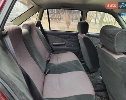 Червоний Деу Нексія, об'ємом двигуна 1.5 л та пробігом 137 тис. км за 900 $, фото 15 на Automoto.ua