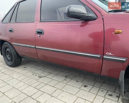 Червоний Деу Нексія, об'ємом двигуна 1.5 л та пробігом 305 тис. км за 1450 $, фото 4 на Automoto.ua