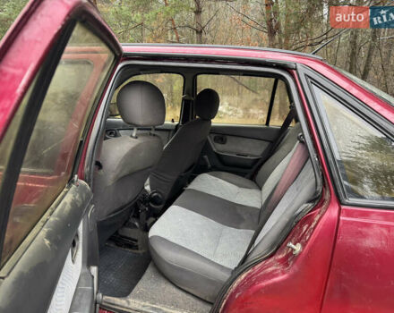 Червоний Деу Нексія, об'ємом двигуна 1.5 л та пробігом 150 тис. км за 1100 $, фото 9 на Automoto.ua