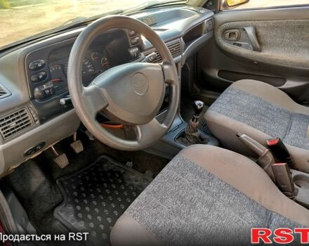 Красный Дэу Нексия, объемом двигателя 1.5 л и пробегом 320 тыс. км за 1500 $, фото 6 на Automoto.ua
