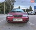 Красный Дэу Нексия, объемом двигателя 1.5 л и пробегом 263 тыс. км за 2050 $, фото 1 на Automoto.ua