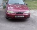Красный Дэу Нексия, объемом двигателя 1.5 л и пробегом 330 тыс. км за 2000 $, фото 1 на Automoto.ua