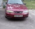 Красный Дэу Нексия, объемом двигателя 1.5 л и пробегом 330 тыс. км за 2000 $, фото 1 на Automoto.ua