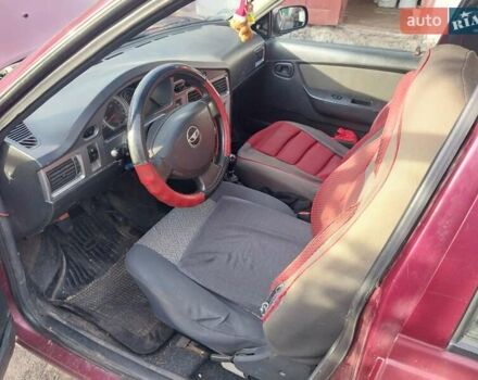 Червоний Деу Нексія, об'ємом двигуна 1.5 л та пробігом 235 тис. км за 1700 $, фото 6 на Automoto.ua