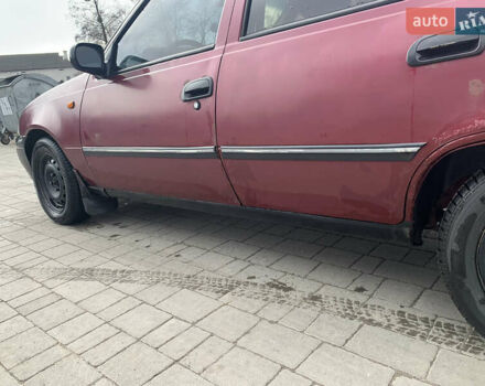Червоний Деу Нексія, об'ємом двигуна 1.5 л та пробігом 305 тис. км за 1450 $, фото 3 на Automoto.ua