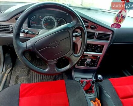 Красный Дэу Нексия, объемом двигателя 1.5 л и пробегом 180 тыс. км за 2300 $, фото 5 на Automoto.ua