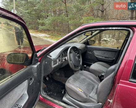 Червоний Деу Нексія, об'ємом двигуна 1.5 л та пробігом 150 тис. км за 1100 $, фото 7 на Automoto.ua