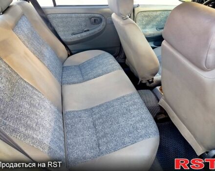 Красный Дэу Нексия, объемом двигателя 1.5 л и пробегом 320 тыс. км за 1500 $, фото 7 на Automoto.ua