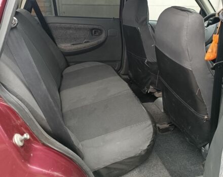 Червоний Деу Нексія, об'ємом двигуна 1.5 л та пробігом 111 тис. км за 1400 $, фото 5 на Automoto.ua