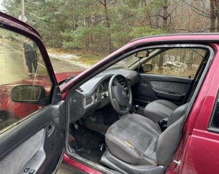 Червоний Деу Нексія, об'ємом двигуна 1.5 л та пробігом 150 тис. км за 1000 $, фото 8 на Automoto.ua