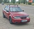 Красный Дэу Нексия, объемом двигателя 1.5 л и пробегом 230 тыс. км за 2458 $, фото 1 на Automoto.ua