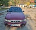 Красный Дэу Нексия, объемом двигателя 1.5 л и пробегом 245 тыс. км за 2000 $, фото 1 на Automoto.ua